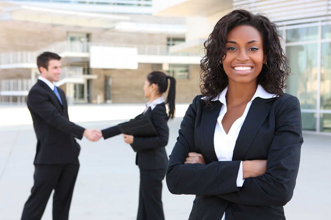 Business woman and work colleagues