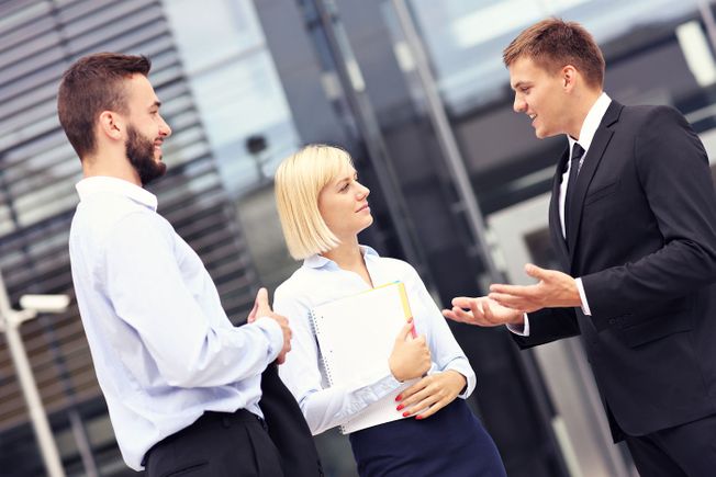 smiling business workers during a meeting