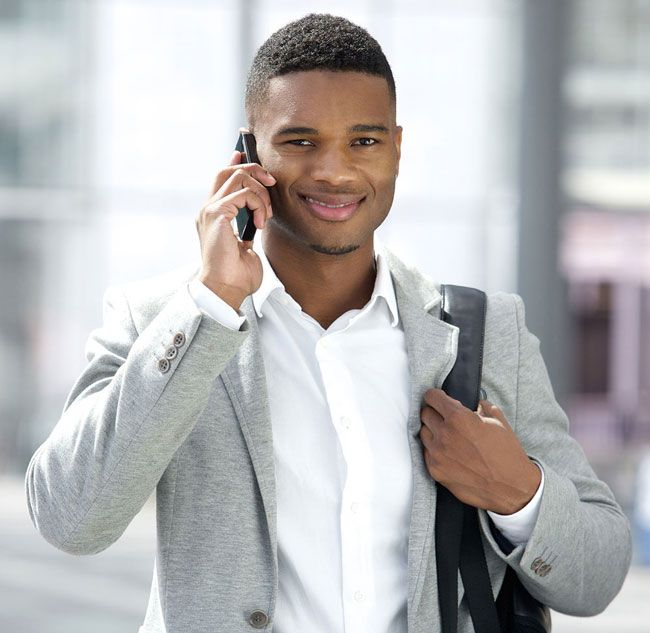 Business worker on his mobile phone